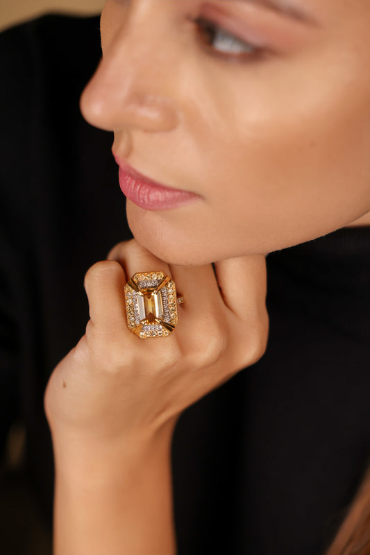 Close-up of the golden topaz and diamond detailing on the Hera Ring