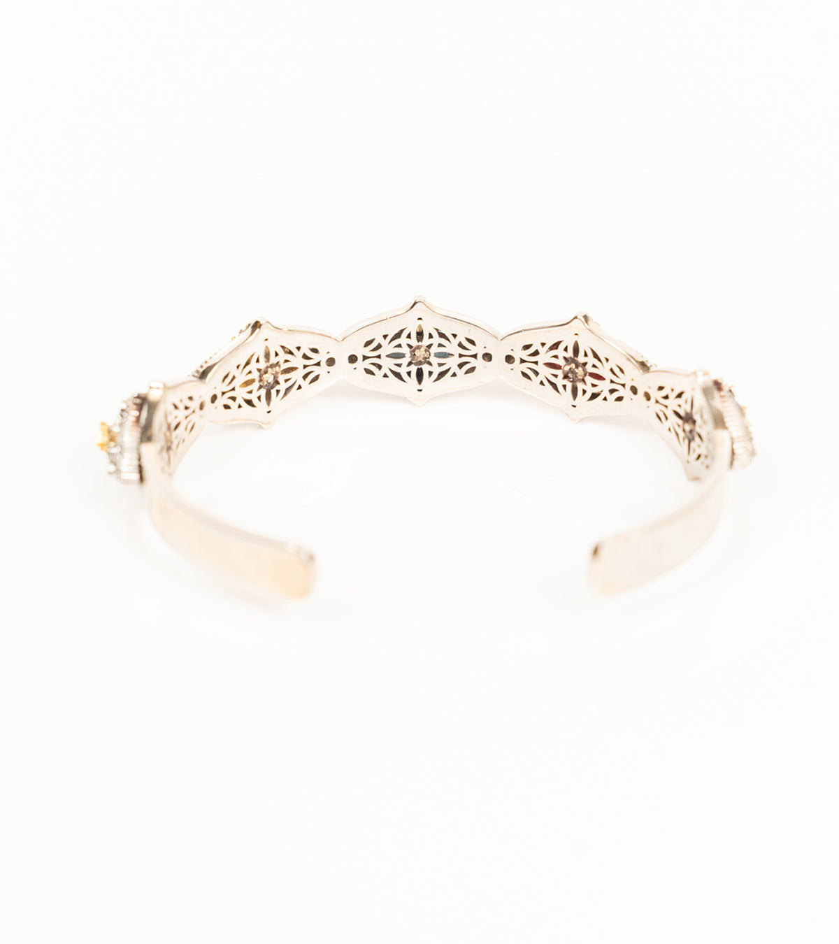 Bombay Slim cuff worn alone on the wrist, paired with delicate rings for an everyday look