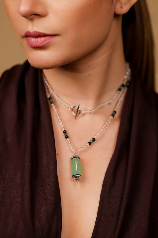 Close-up of the aqua onyx and Polki diamond detailing on the Altair Pendant