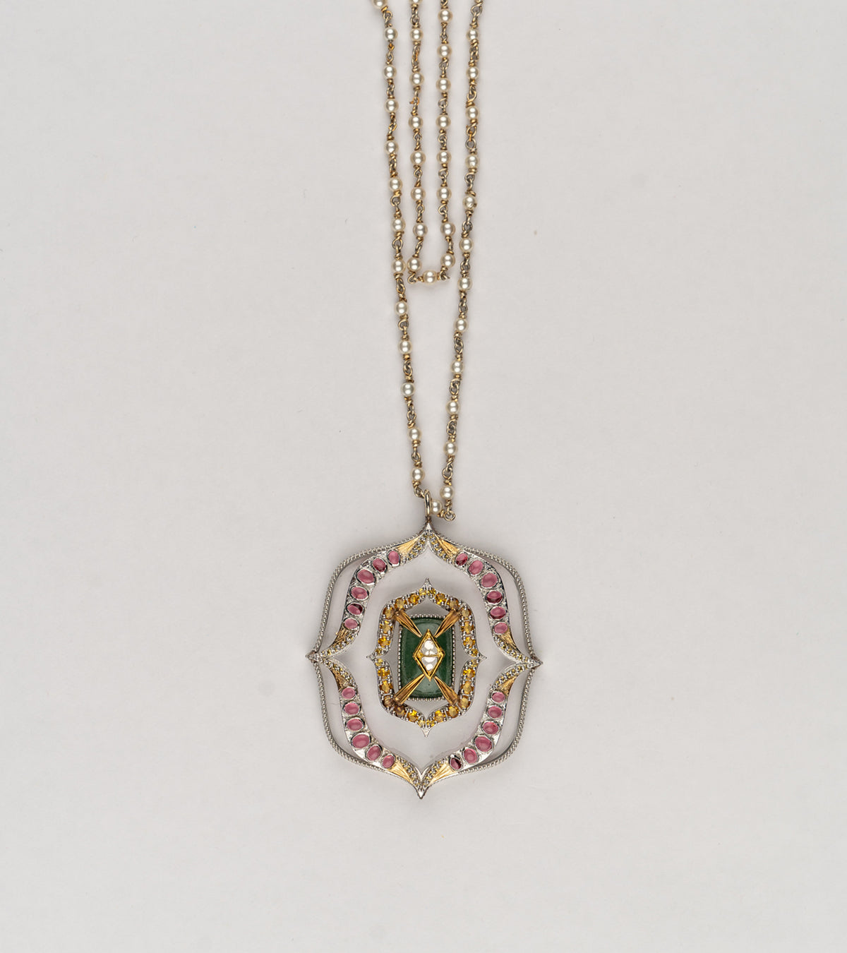 Amara Necklace worn with simple, structured clothing, letting the pendant stand as the focal point