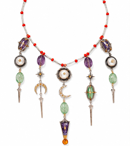 Amdavad Necklace silver collar strung with coral red beads, featuring a crescent moon, large pearl, violet enamel dagger, star motifs, and sword drop pendants, from the Shashikala collection by UBAA