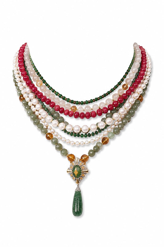 Anuradha Necklace with eight strands of natural aventurine, quartz, onyx, Japanese pearls and beads, finished with a gold and aventurine pendant