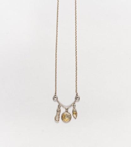 Detail of the Polki diamond accents on the Ari Necklace charms