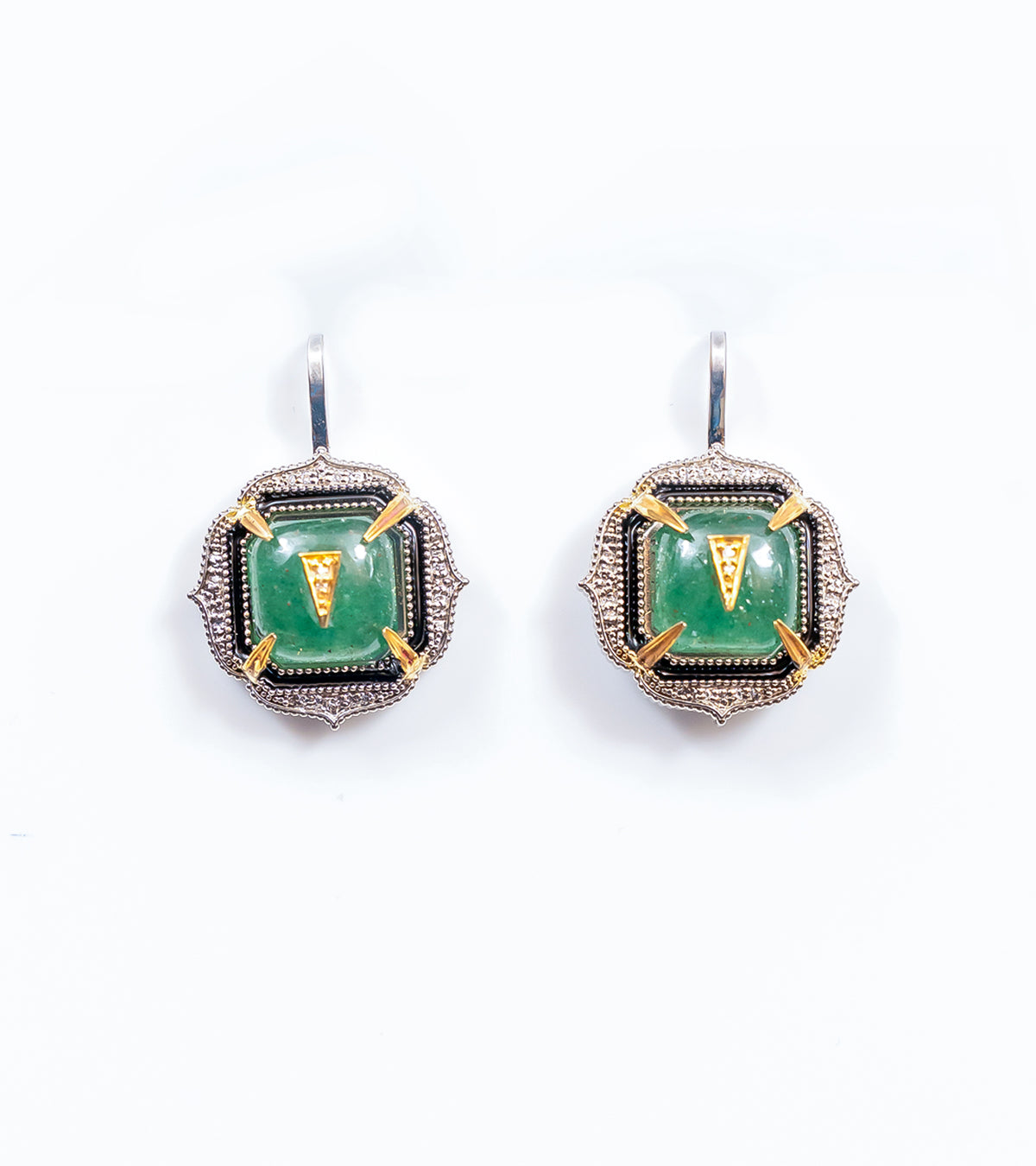 Close-up of Aurora Earrings highlighting the crafted kyanite crystal and natural diamond accents