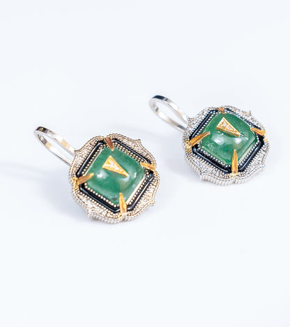 Detail shot of Aurora Earrings capturing the layered texture of the enamel and gemstone craftsmanship