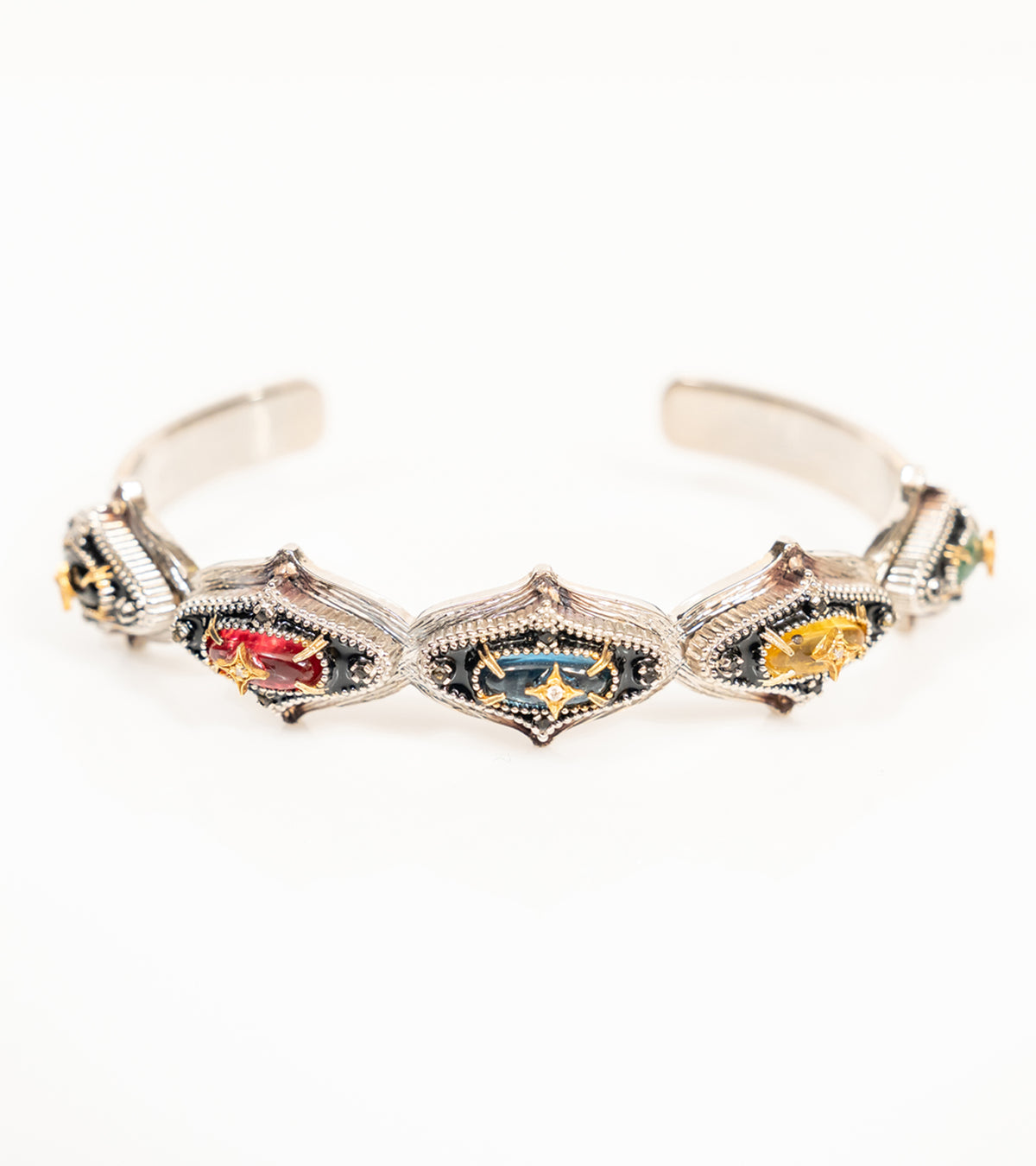 Detail shot of the Bombay Slim cuff showing the black hand-painted enamel finish and delicate stone setting