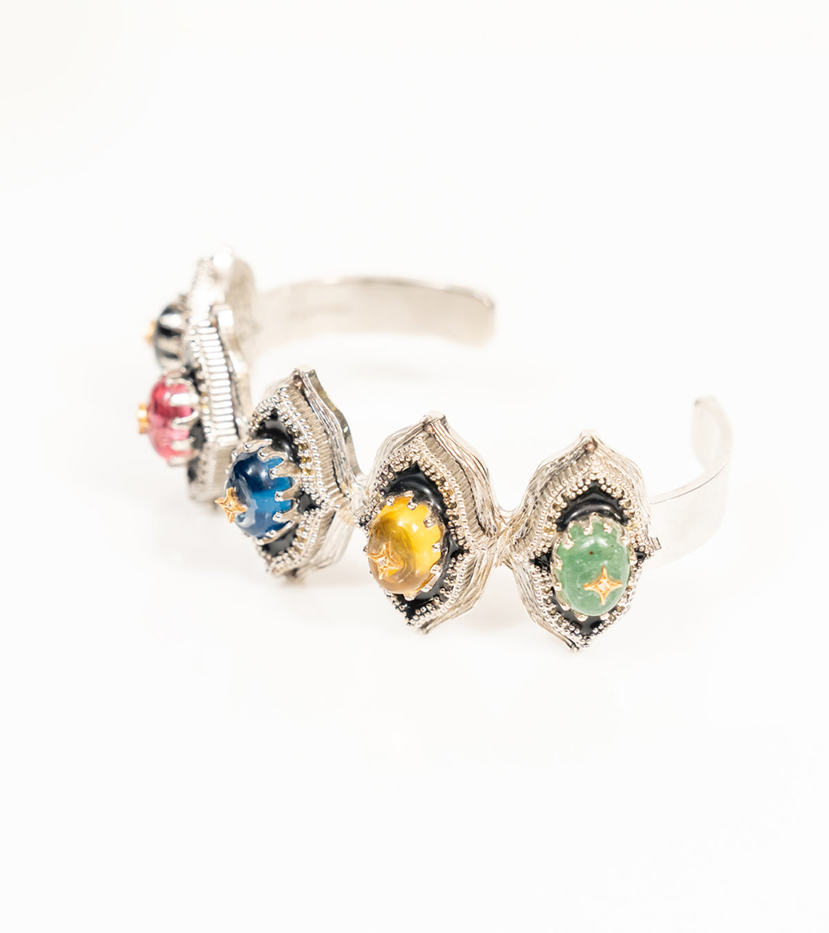 Detail shot of the Bombay Stack Bold cuff capturing the black hand-painted enamel finish and milgrain edging