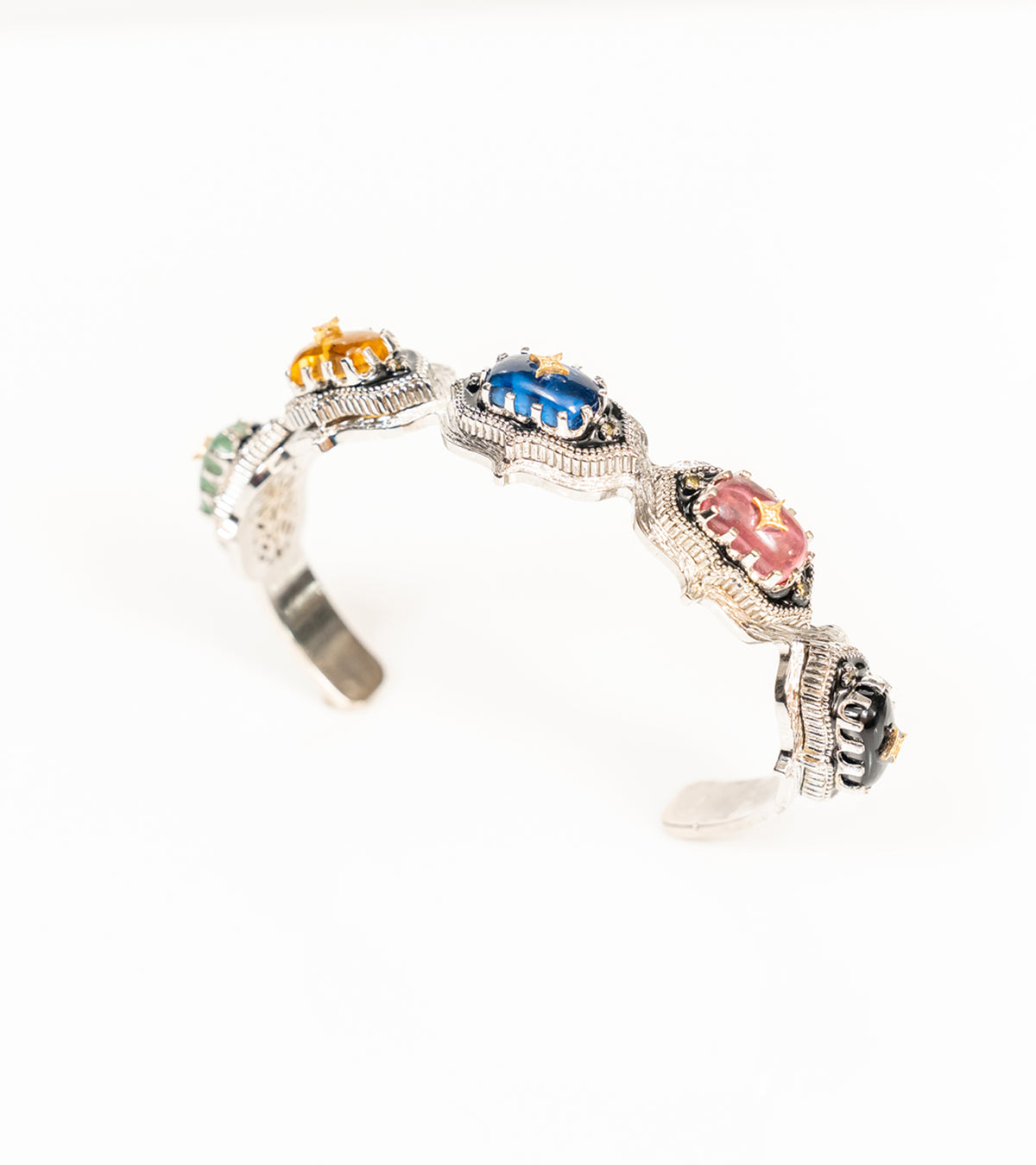 Bombay Stack Classic silver cuff bracelet featuring cabochon kyanite, tourmaline, citrine, aventurine, and black onyx stones with 18K gold accents