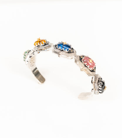 Bombay Stack Classic silver cuff bracelet featuring cabochon kyanite, tourmaline, citrine, aventurine, and black onyx stones with 18K gold accents