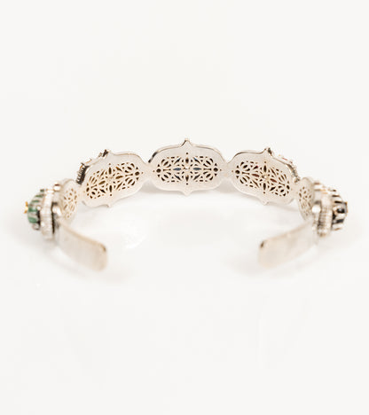 Bombay Stack Classic cuff worn on the wrist as the centre piece of a stacked bracelet look