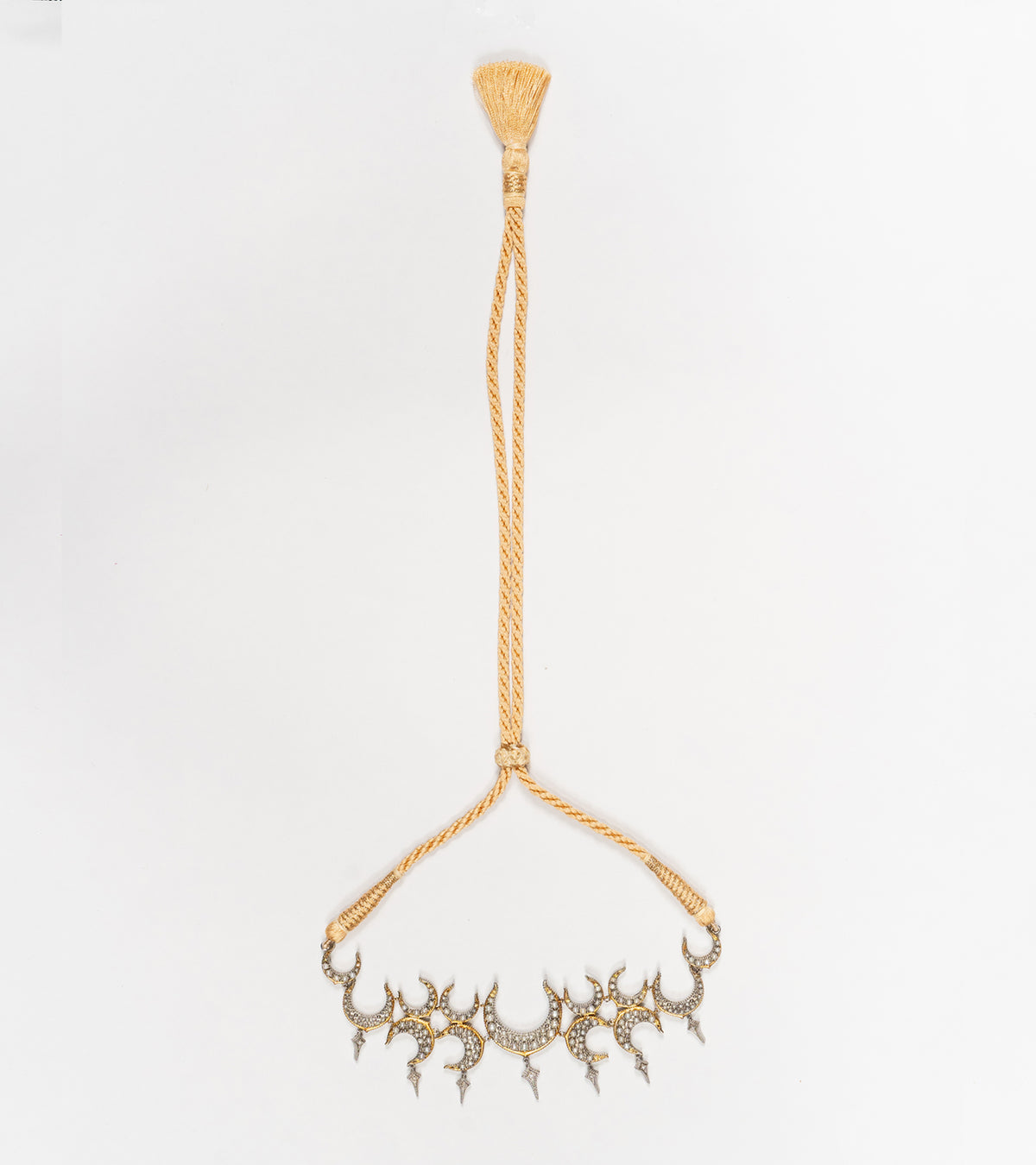 Side profile of the Icra Choker showing its structured silhouette and enamel-detailed silver work