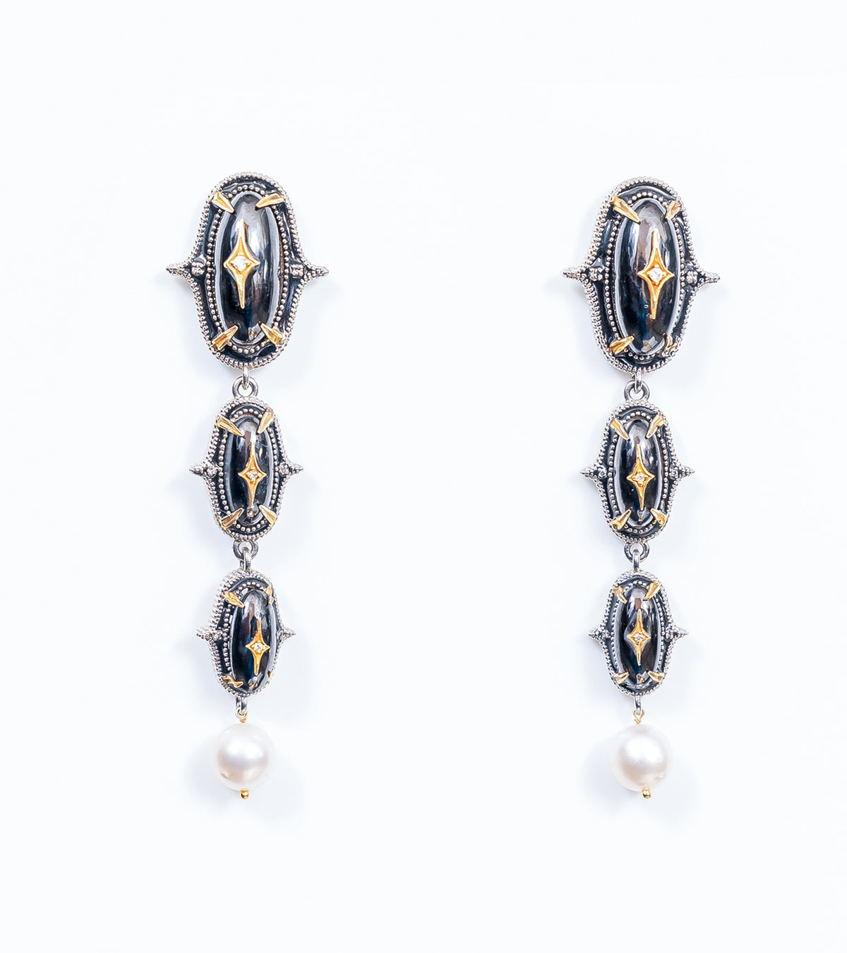 Jaipur Danglers in silver with 18K gold accents, hand-painted black enamel, black onyx, and China pearl drops