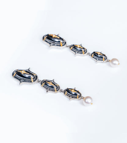 Detail of the China pearl drop finishing the Jaipur Danglers