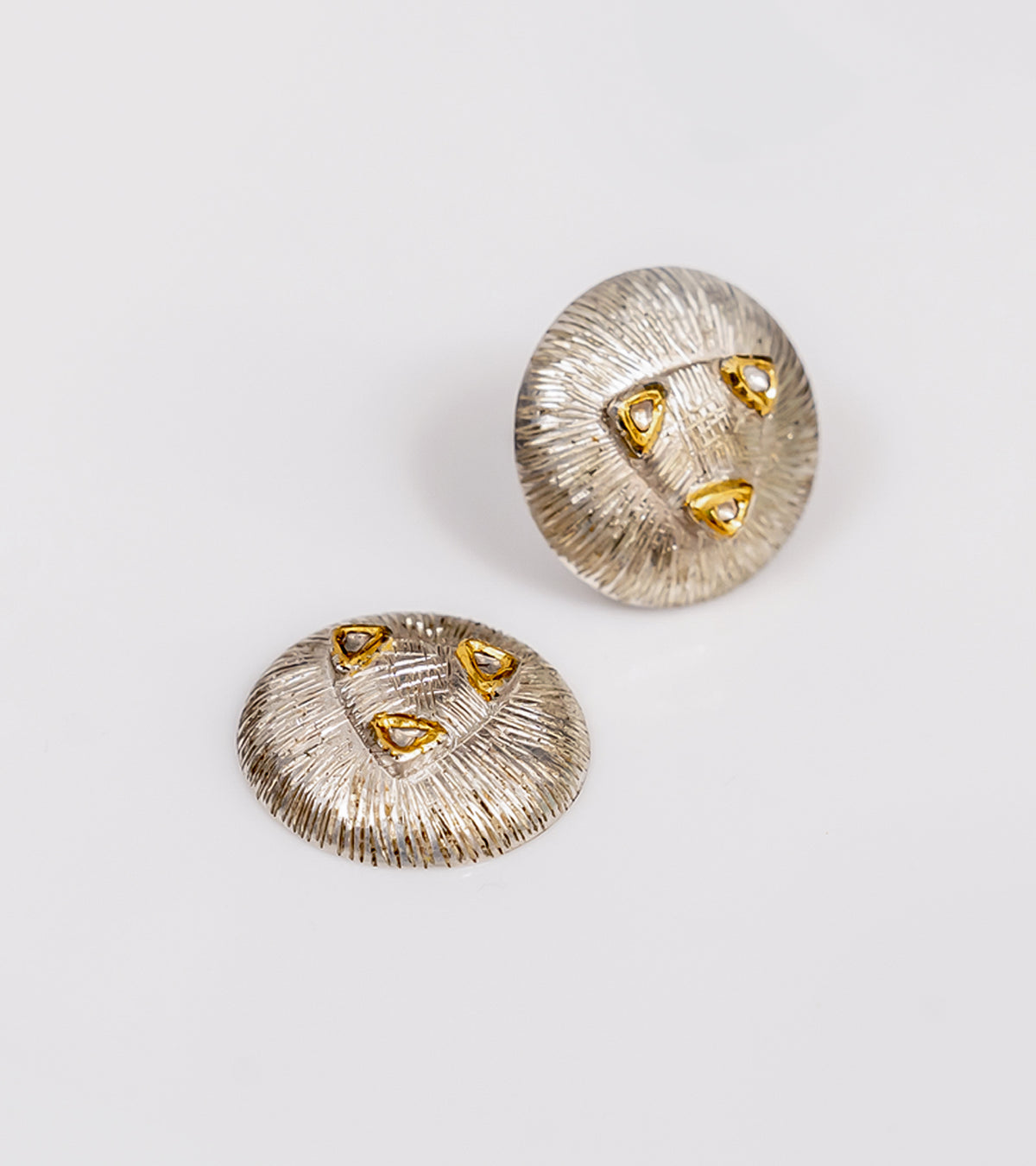Detail of the fine gold accents framing the Polki diamonds on the Mia Earrings