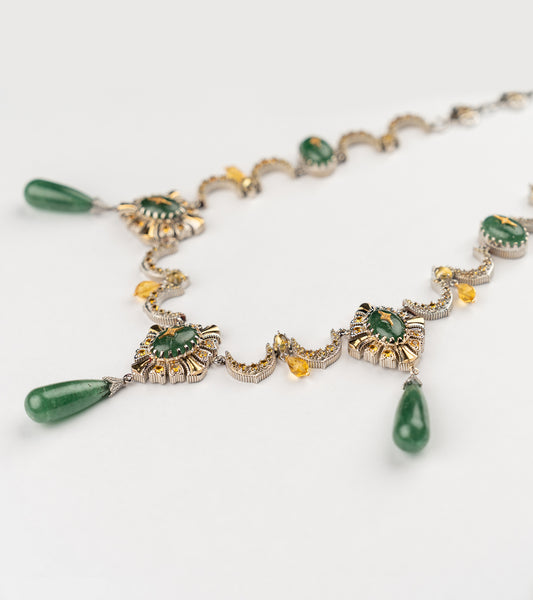 Neelima Necklace with scalloped gold and diamond work, anchored by a central aventurine stone with aventurine drops and crafted yellow citrine
