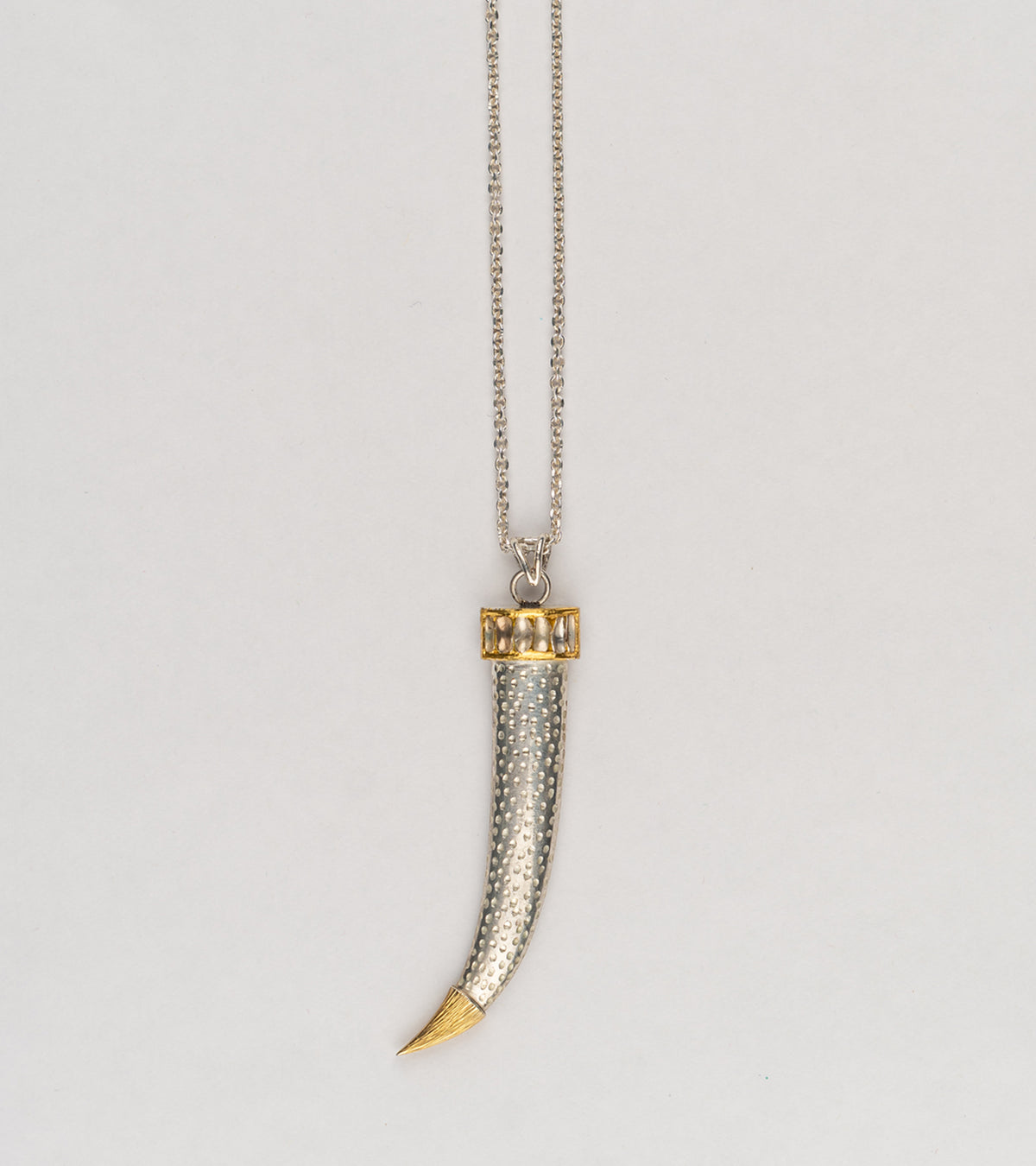 Neo Necklace by UBAA featuring a dagger motif pendant in 22K Kundan gold with Polki diamonds