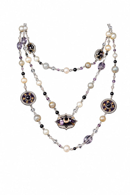 Prive Necklace with three layered strands of amethyst crystal, natural onyx, crystals, and pearls, finished with hand-painted purple enamel