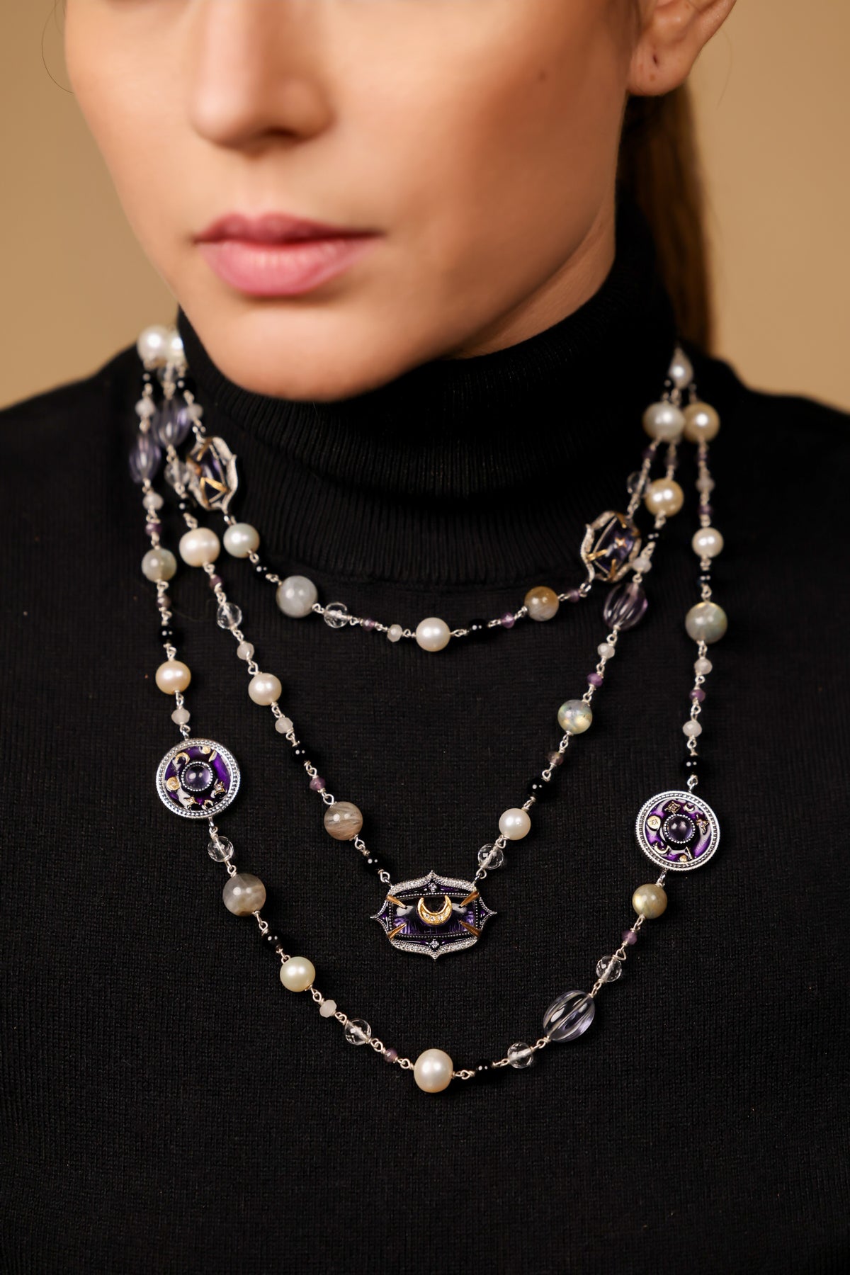 Prive Necklace worn with a deep neckline, the layers framing the collarbone