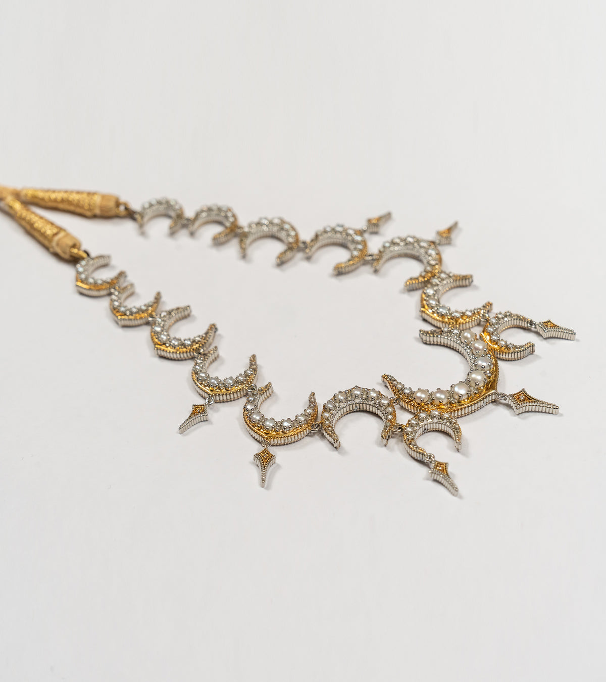 Ragini Necklace with a crescent motif in black hand-painted enamel, diamonds, and soft China pearls in sterling silver