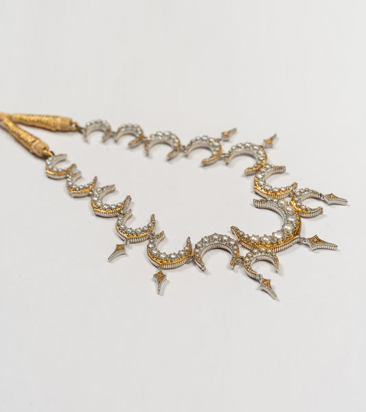 Ragini Necklace with a crescent motif in black hand-painted enamel, diamonds, and soft China pearls in sterling silver