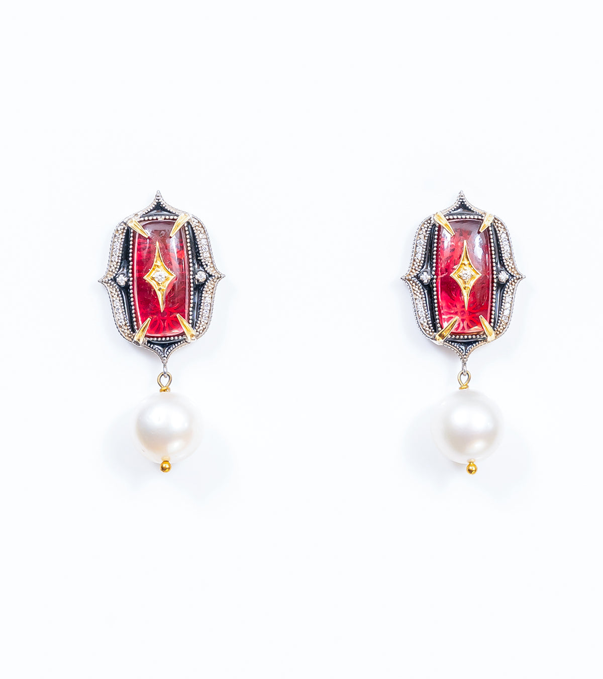 Rewa Earrings in silver with 18K gold accents, rose crystal stones, FG VS diamonds, black enamel, and South Sea pearl drops