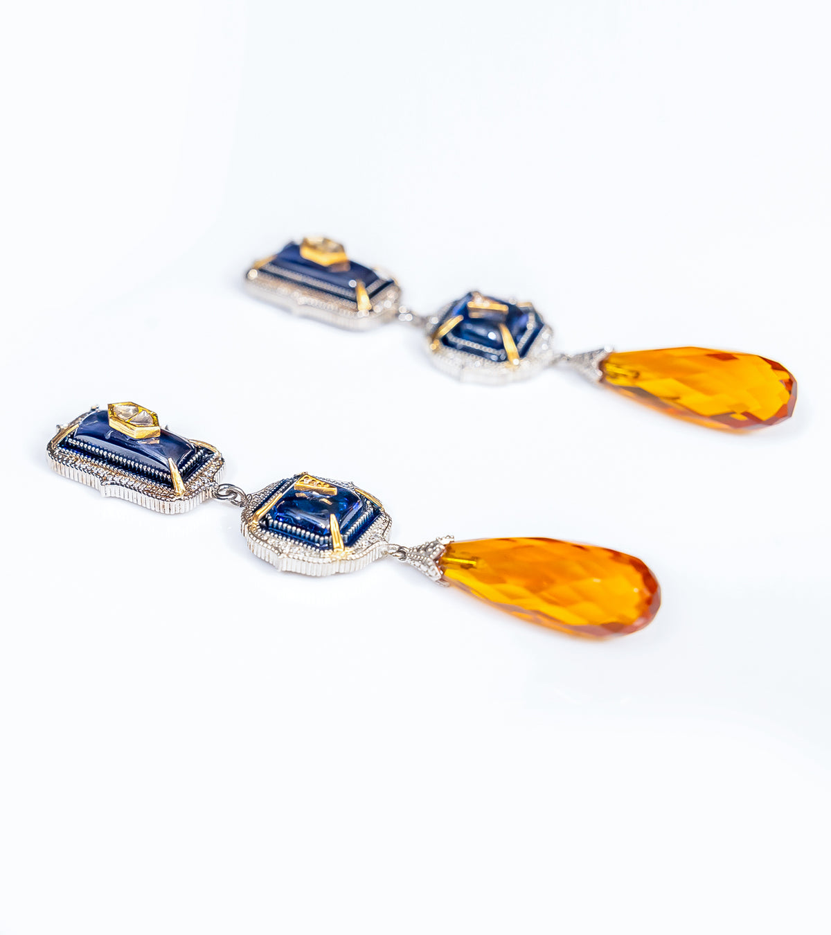 Detail of the luminous yellow topaz crystal drop on the Rumi Earrings