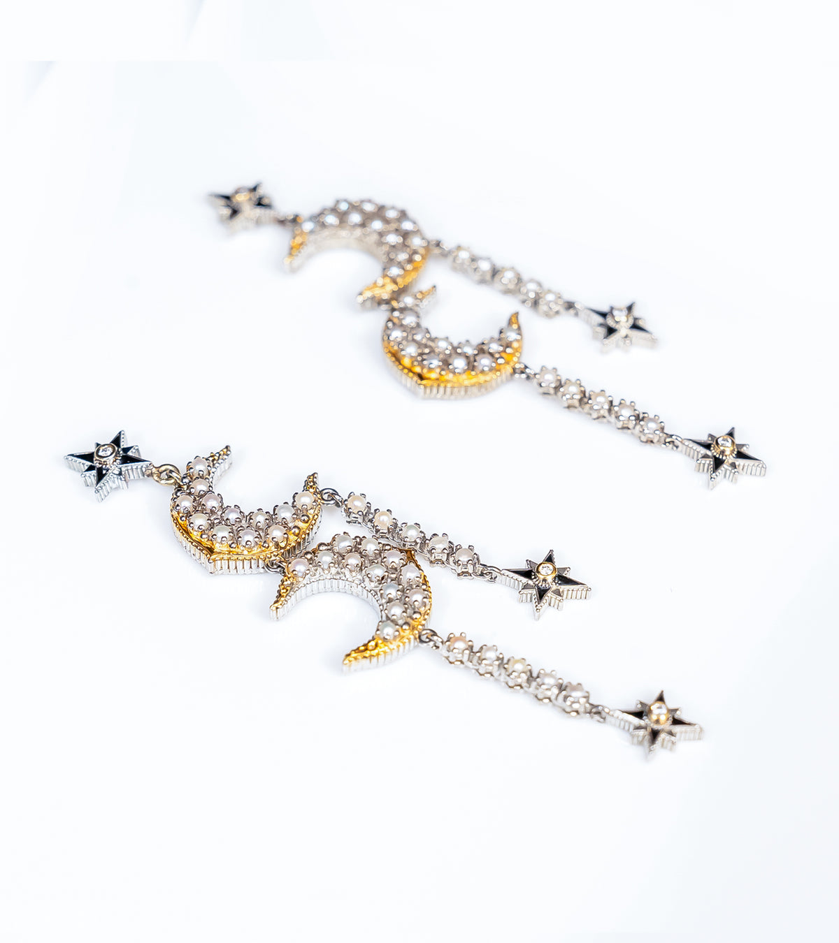 Detail of the delicate Japanese pearls on the Sana Earrings' danglers