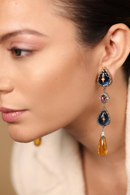Close-up of the three-tier layered drops on the Sara Earrings showing the kyanite and citrine stones