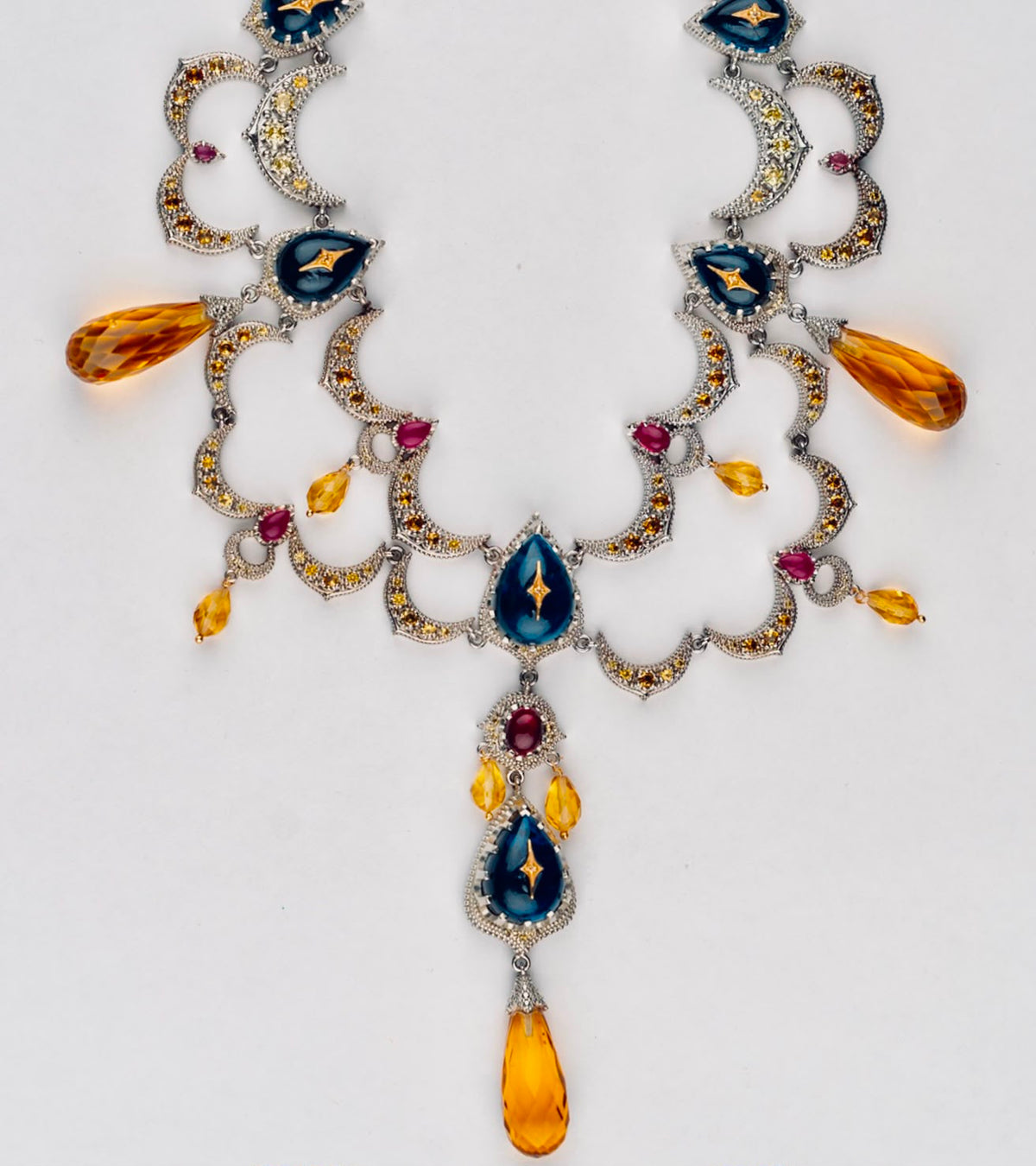 Detail of the citrine briolette drops cascading from each crescent arch of the Sara Necklace