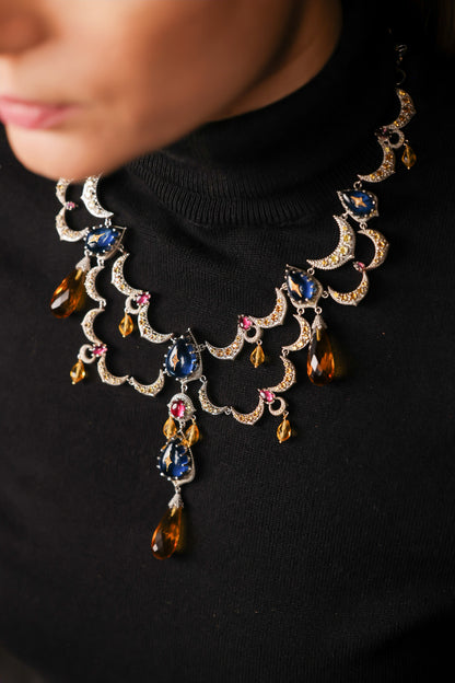 Sara Necklace worn as a standalone statement collar, styled with minimal earrings and a simple neckline
