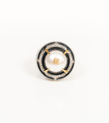 Detail of the black hand-painted enamel and vintage-inspired craftsmanship on the Shakuntala Ring