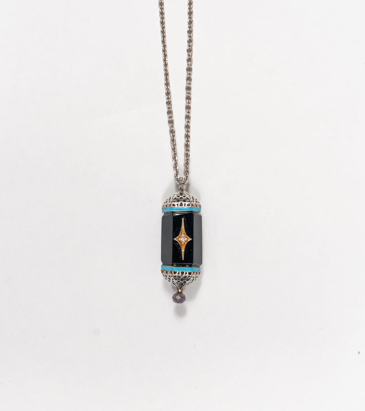 Sirius Pendant with black onyx, natural diamonds, framed in silver with 18K gold accents and hand-painted turquoise enamel