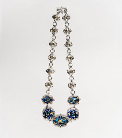 Detail of the hand-painted blue enamel work on the Taskan Choker
