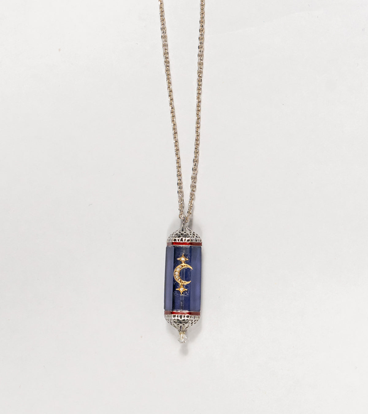 Vega Pendant with a 36.5 ct amethyst centerpiece, framed in silver with 18K gold accents and hand-painted enamel
