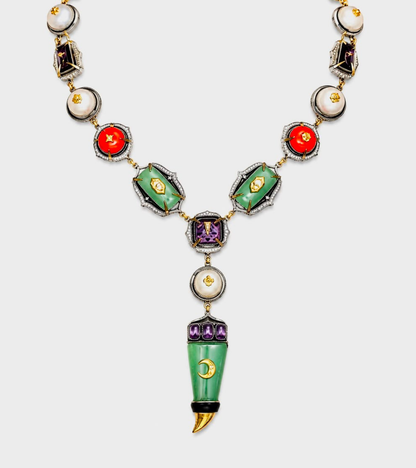 Zuri Necklace with amethyst crystal, aqua onyx, coral, and button pearls, accented with diamonds, silver, and gold, finished in black enamel